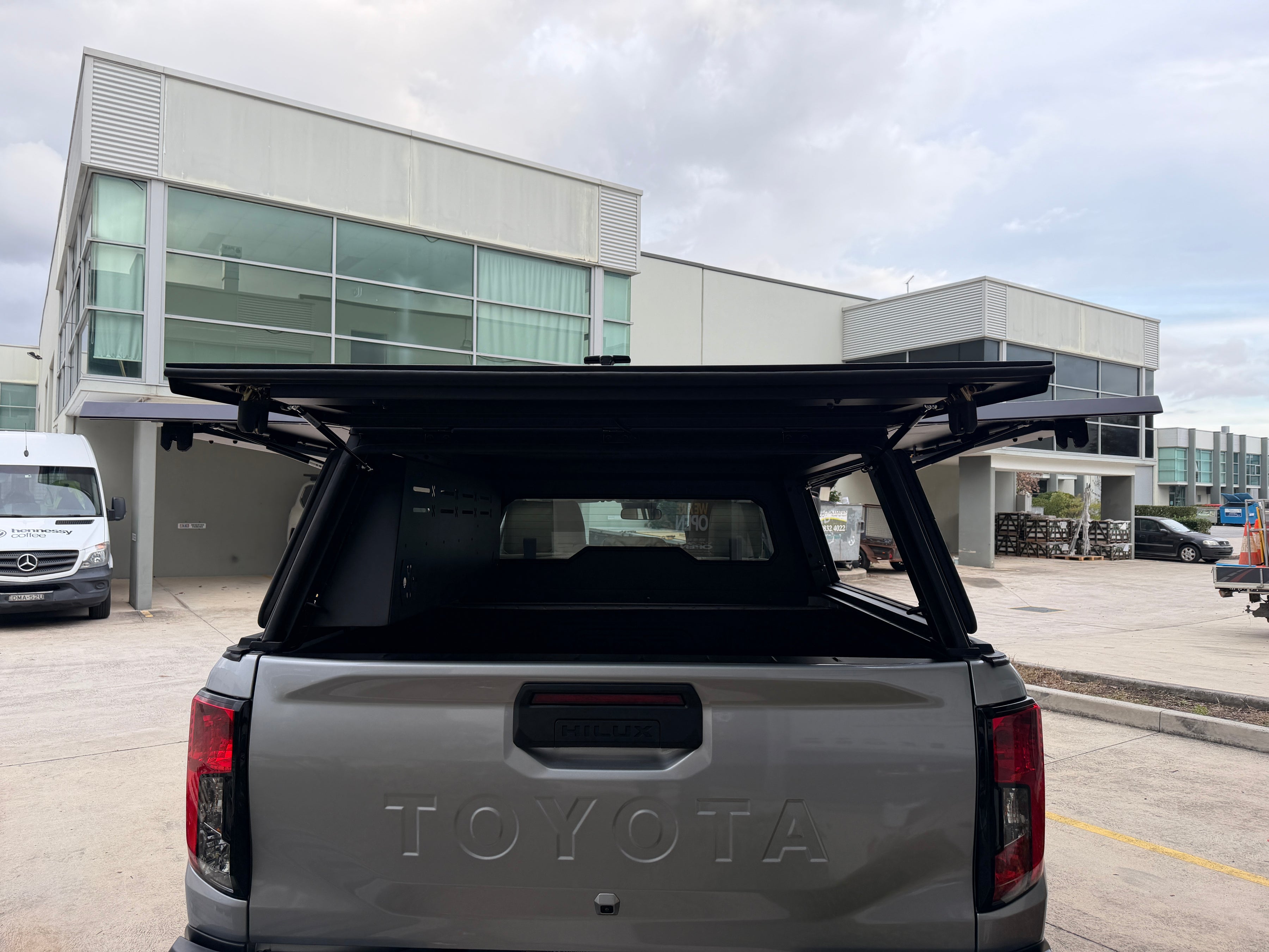 Side storage compartment on TIGER-X Toyota Hilux canopy
